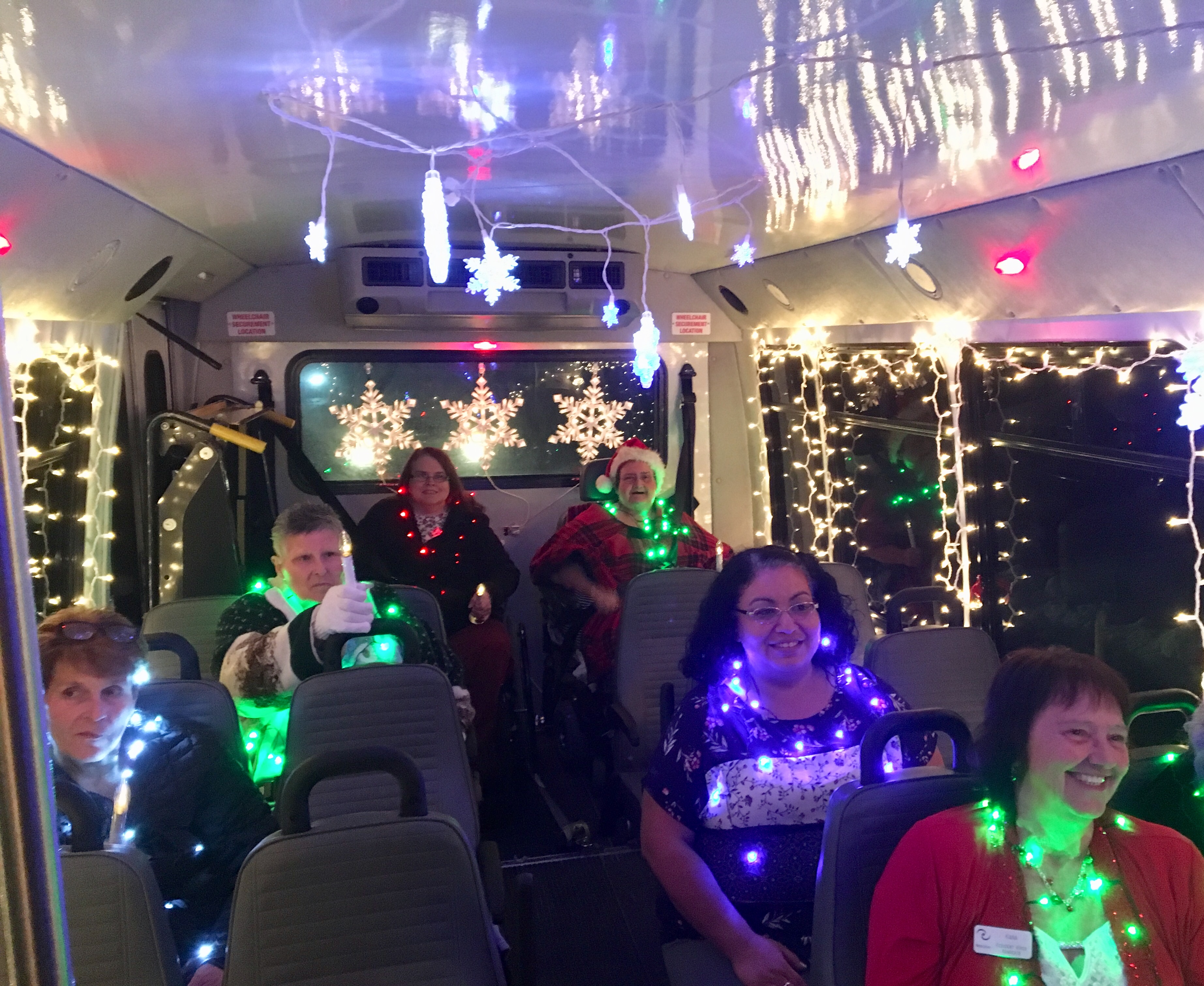 inside of bus decorated with lights